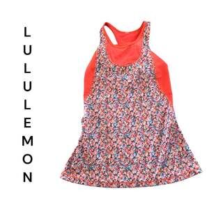 Lululemon mesh with me salmon pink floral racer back print woman’s size 6 dot
